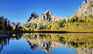 Preview wallpaper mountains, reflection, sky, grass, lake