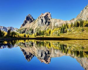 Preview wallpaper mountains, reflection, sky, grass, lake