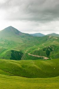 Preview wallpaper mountains, relief, green, cloudy