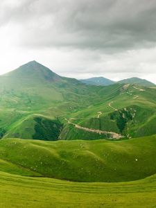 Preview wallpaper mountains, relief, green, cloudy