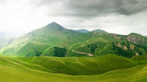 Preview wallpaper mountains, relief, green, cloudy