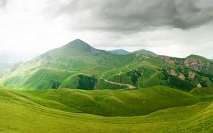 Preview wallpaper mountains, relief, green, cloudy