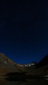 Preview wallpaper mountains, relief, lake, starry sky, night