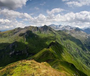 Preview wallpaper mountains, relief, shadows, sharp, clouds, sky, height, landscape, movement