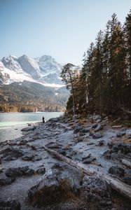 Preview wallpaper mountains, river, coast, trees, silhouette, alone