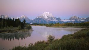 Preview wallpaper mountains, river, coast, vegetation, evening, trees, tops, clouds