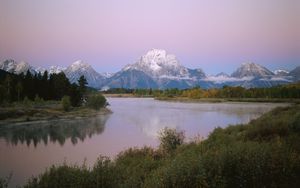 Preview wallpaper mountains, river, coast, vegetation, evening, trees, tops, clouds