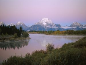 Preview wallpaper mountains, river, coast, vegetation, evening, trees, tops, clouds