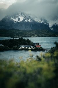 Preview wallpaper mountains, river, island, houses, nature