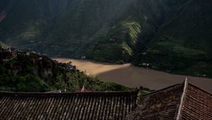 Preview wallpaper mountains, river, roofs, pagodas, clouds