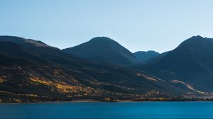 Preview wallpaper mountains, river, sky, flowers