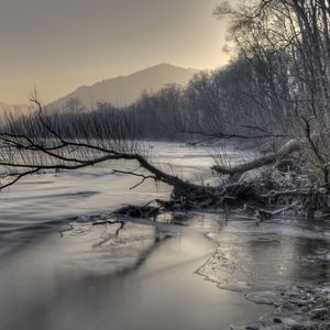 Preview wallpaper mountains, river, snow, snag