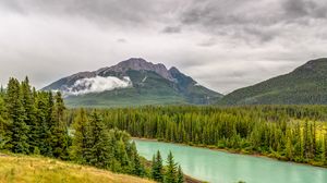Preview wallpaper mountains, river, spruce, forest, clouds, sky