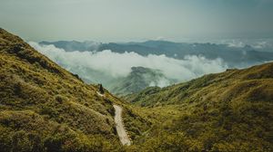Preview wallpaper mountains, road, aerial view, fog, clouds, nature