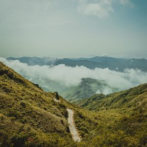 Preview wallpaper mountains, road, aerial view, fog, clouds, nature