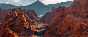 Preview wallpaper mountains, road, aerial view, valley, rocks