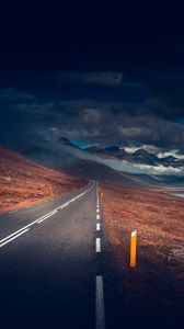 Preview wallpaper mountains, road, asphalt, marking, lake, dark, clouds