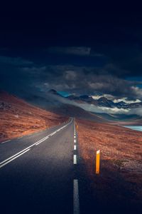 Preview wallpaper mountains, road, asphalt, marking, lake, dark, clouds