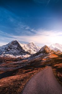 Preview wallpaper mountains, road, asphalt, peaks, snow, sky, switzerland