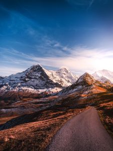 Preview wallpaper mountains, road, asphalt, peaks, snow, sky, switzerland