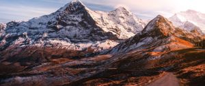 Preview wallpaper mountains, road, asphalt, peaks, snow, sky, switzerland