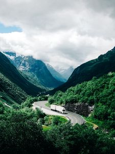 Preview wallpaper mountains, road, car, clouds, norway