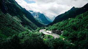 Preview wallpaper mountains, road, car, clouds, norway