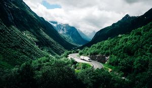 Preview wallpaper mountains, road, car, clouds, norway