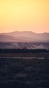 Preview wallpaper mountains, road, car, dusk, landscape