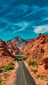 Preview wallpaper mountains, road, distance, rocks, valley