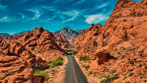 Preview wallpaper mountains, road, distance, rocks, valley