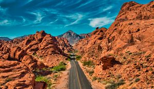 Preview wallpaper mountains, road, distance, rocks, valley