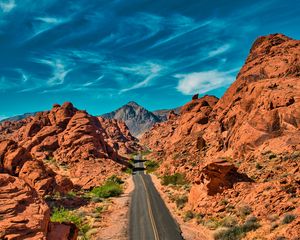 Preview wallpaper mountains, road, distance, rocks, valley