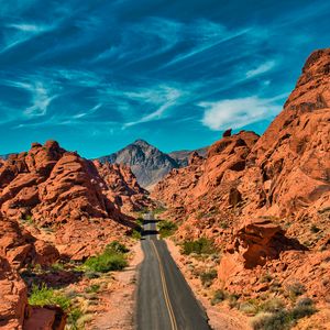 Preview wallpaper mountains, road, distance, rocks, valley