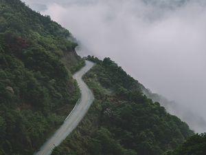 Preview wallpaper mountains, road, fog, forest, slope, height