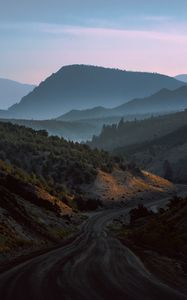 Preview wallpaper mountains, road, fog, evening, nature