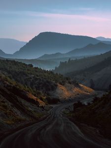 Preview wallpaper mountains, road, fog, evening, nature