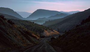 Preview wallpaper mountains, road, fog, evening, nature
