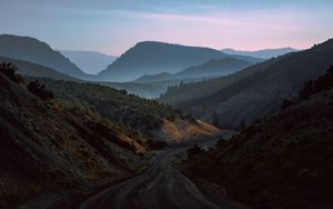 Preview wallpaper mountains, road, fog, evening, nature