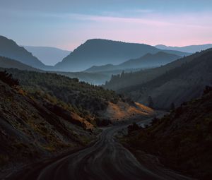 Preview wallpaper mountains, road, fog, evening, nature