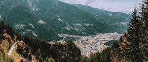 Preview wallpaper mountains, road, landscape, sun, trees, slope