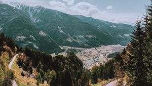 Preview wallpaper mountains, road, landscape, sun, trees, slope