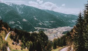 Preview wallpaper mountains, road, landscape, sun, trees, slope