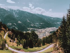 Preview wallpaper mountains, road, landscape, sun, trees, slope