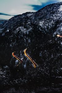 Preview wallpaper mountains, road, light, snowy, top