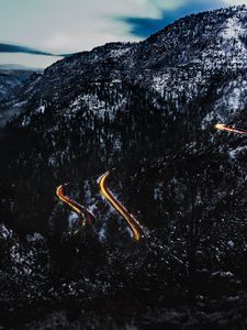 Preview wallpaper mountains, road, light, snowy, top