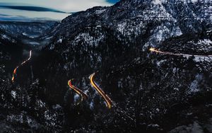 Preview wallpaper mountains, road, light, snowy, top