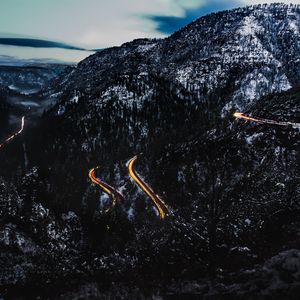 Preview wallpaper mountains, road, light, snowy, top