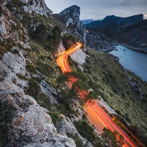 Preview wallpaper mountains, road, lights, movement, long exposure, landscape