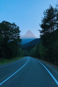 Preview wallpaper mountains, road, marking, trees, branches